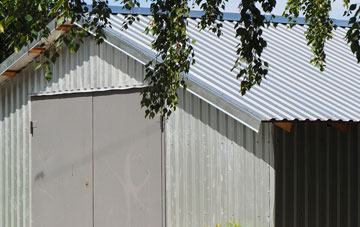 repairing Back Street metal garage roofing